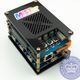 A photo of a simple acrylic case for the MiSTer retro gaming box.